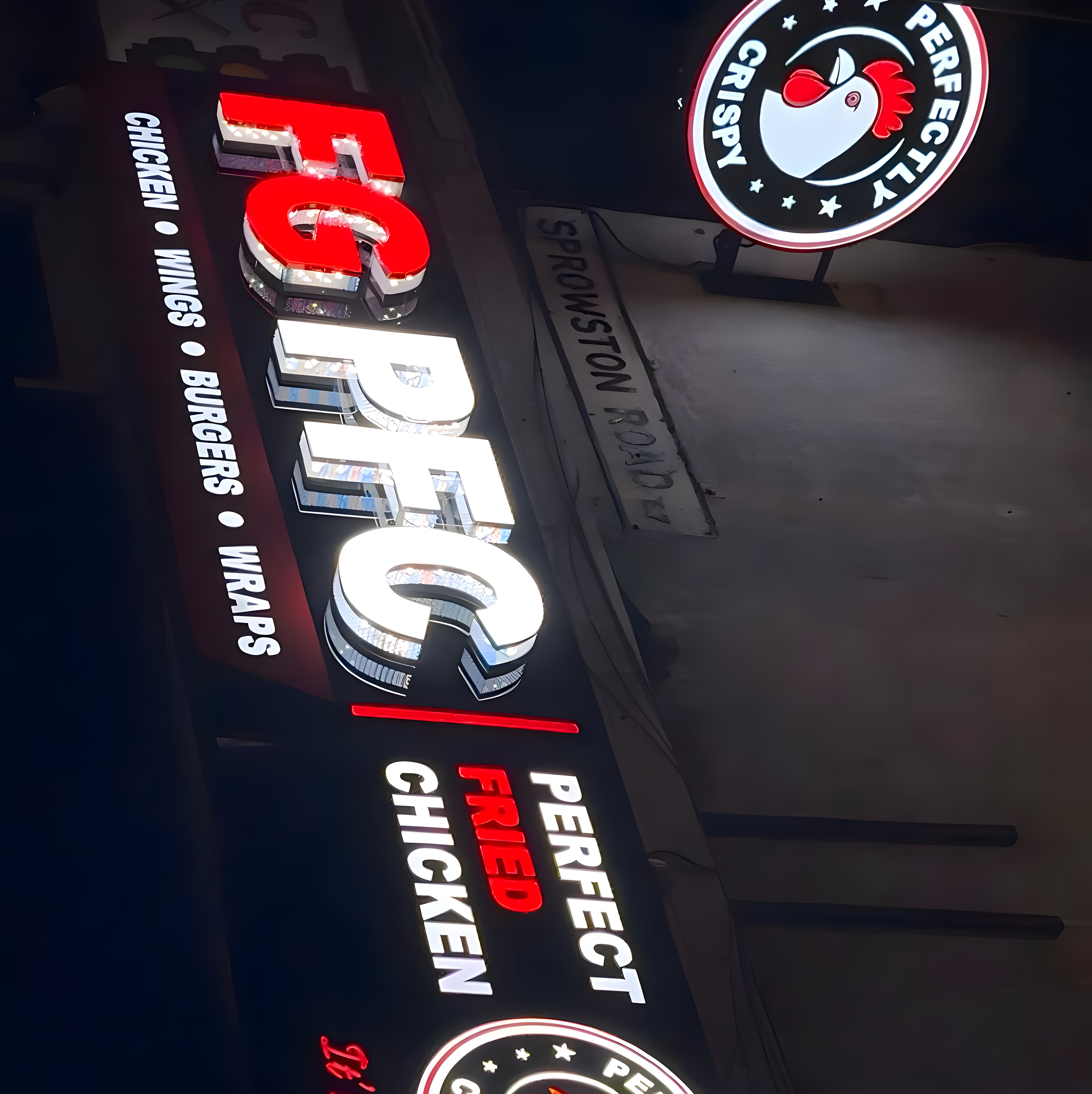 FG PFC illuminated shopfront sign reading Perfect Fried Chicken, chicken, wings, burgers and wraps
